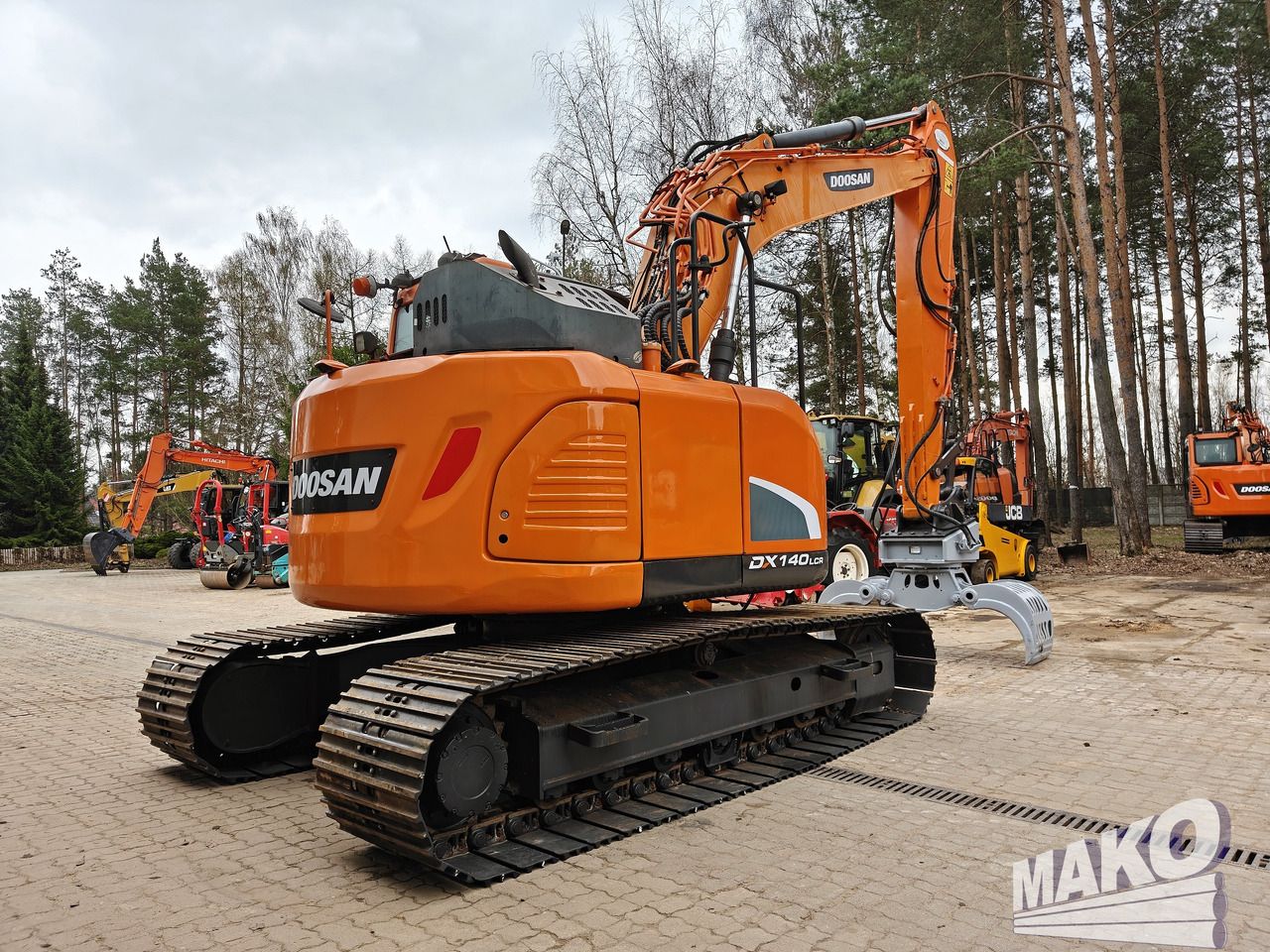 2018 Doosan DX140LCR-5 crawler excavator, rear three-quarter view