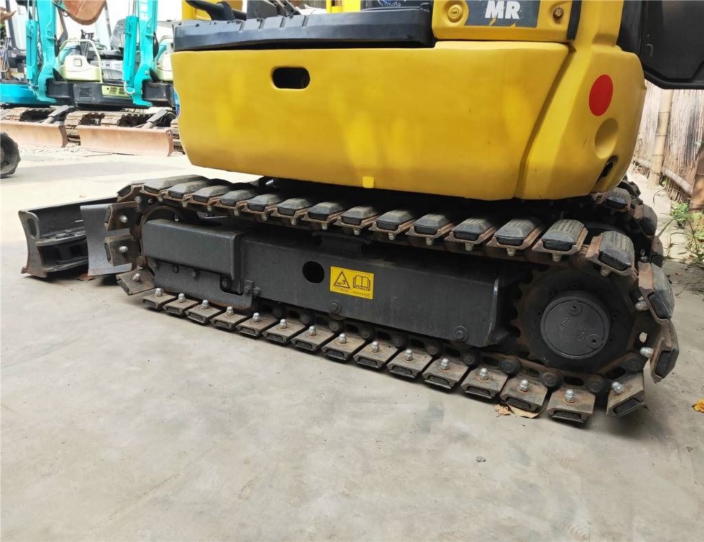 2023 Komatsu PC18MR-3 mini excavator side view of tracks 2023 Komatsu PC18MR-3 mini excavator side view of tracks
