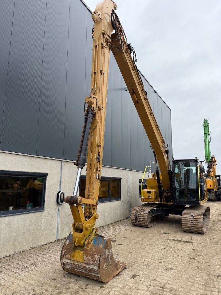 2019 Caterpillar 313FL long-reach crawler excavator, front three-quarter view
