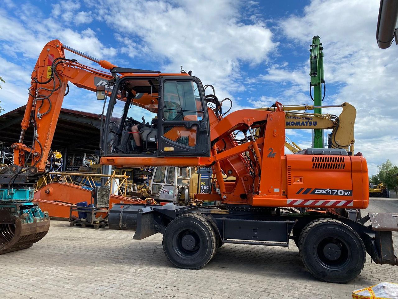2014 Doosan DX170W wheel excavator side view 2014 Doosan DX170W wheel excavator side view