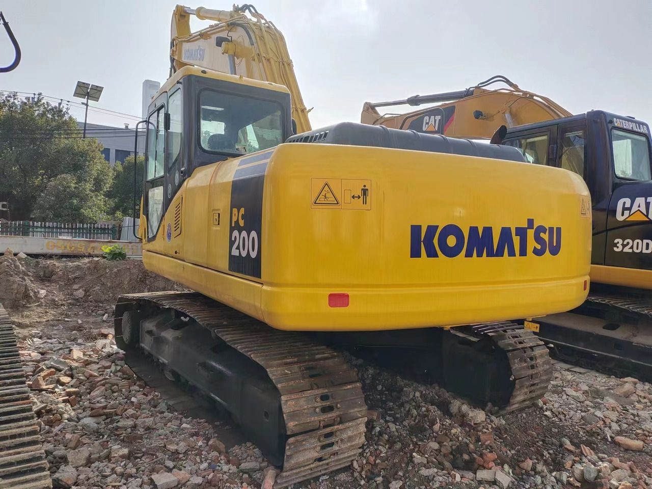 2017 Komatsu PC200-7 crawler excavator, rear three-quarter view 2017 Komatsu PC200-7 crawler excavator, rear three-quarter view