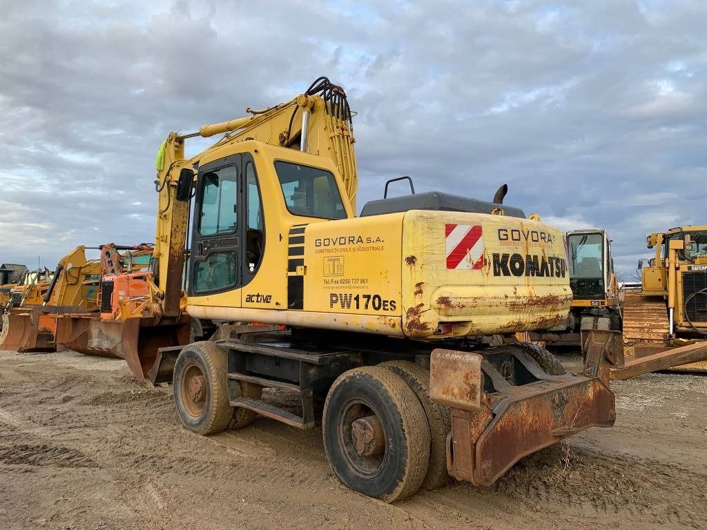 1998 Komatsu PW170ES wheel excavator, rear three-quarter view 1998 Komatsu PW170ES wheel excavator, rear three-quarter view