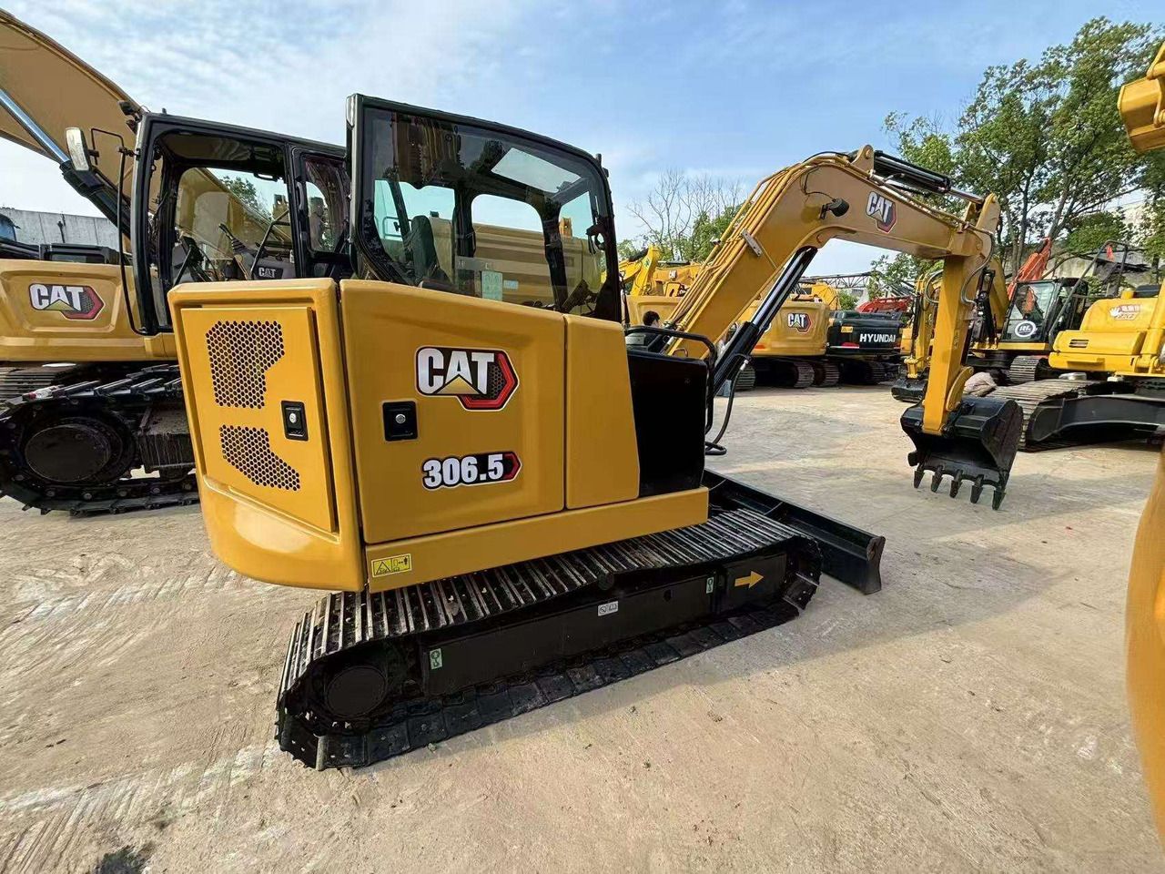 2024 Caterpillar 306.5 crawler excavator, side view