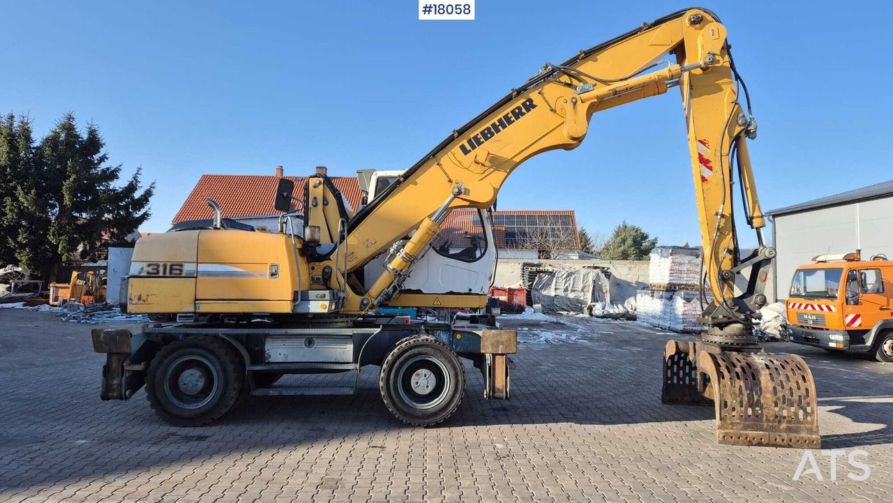 2010 Liebherr A316 LITRONIC material handler side view 2010 Liebherr A316 LITRONIC material handler side view