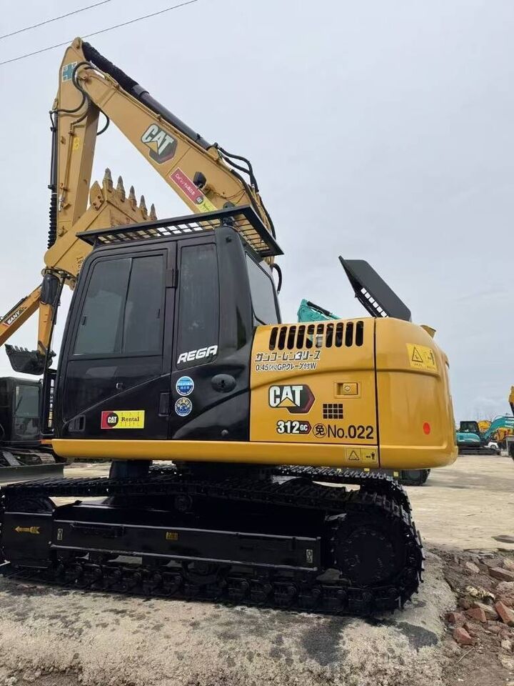 2025 Caterpillar 312 GC crawler excavator, side profile view