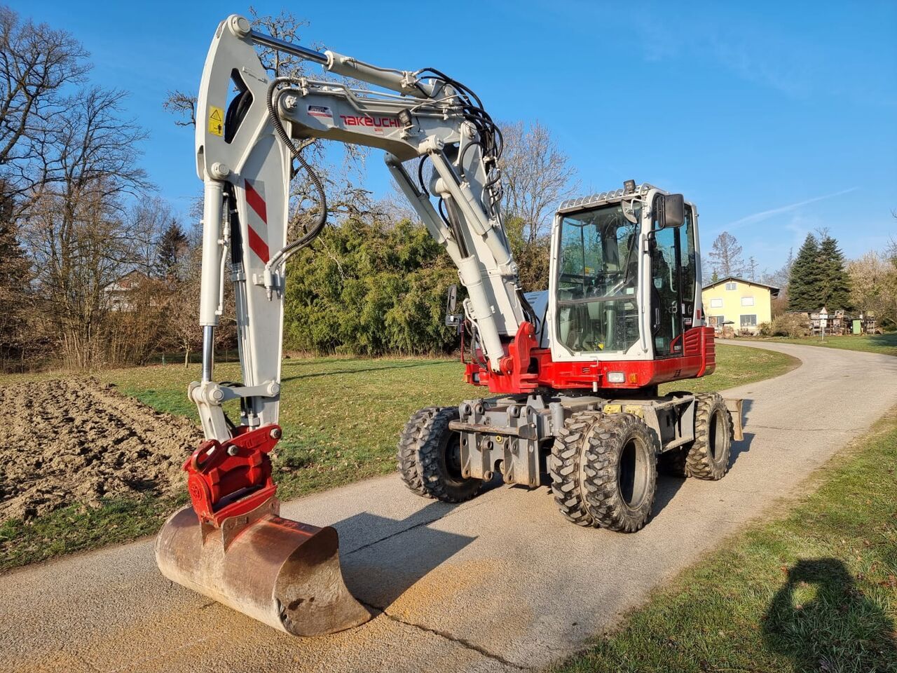 2020 Takeuchi TB295W wheel excavator, front three-quarter view 2020 Takeuchi TB295W wheel excavator, front three-quarter view