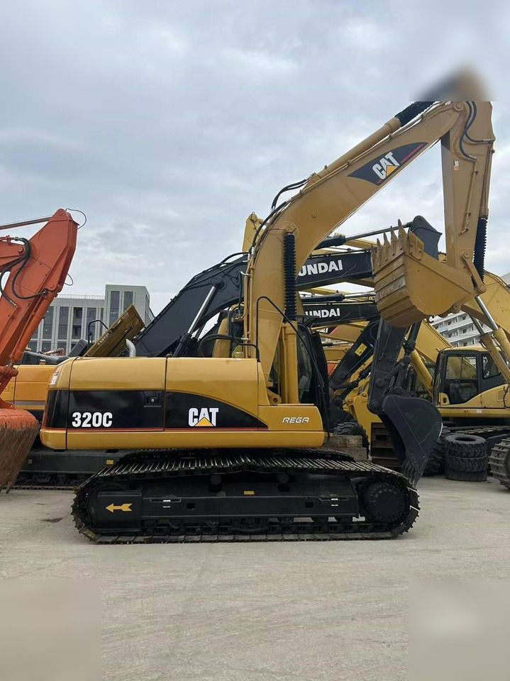 2024 Caterpillar 320C crawler excavator, side view