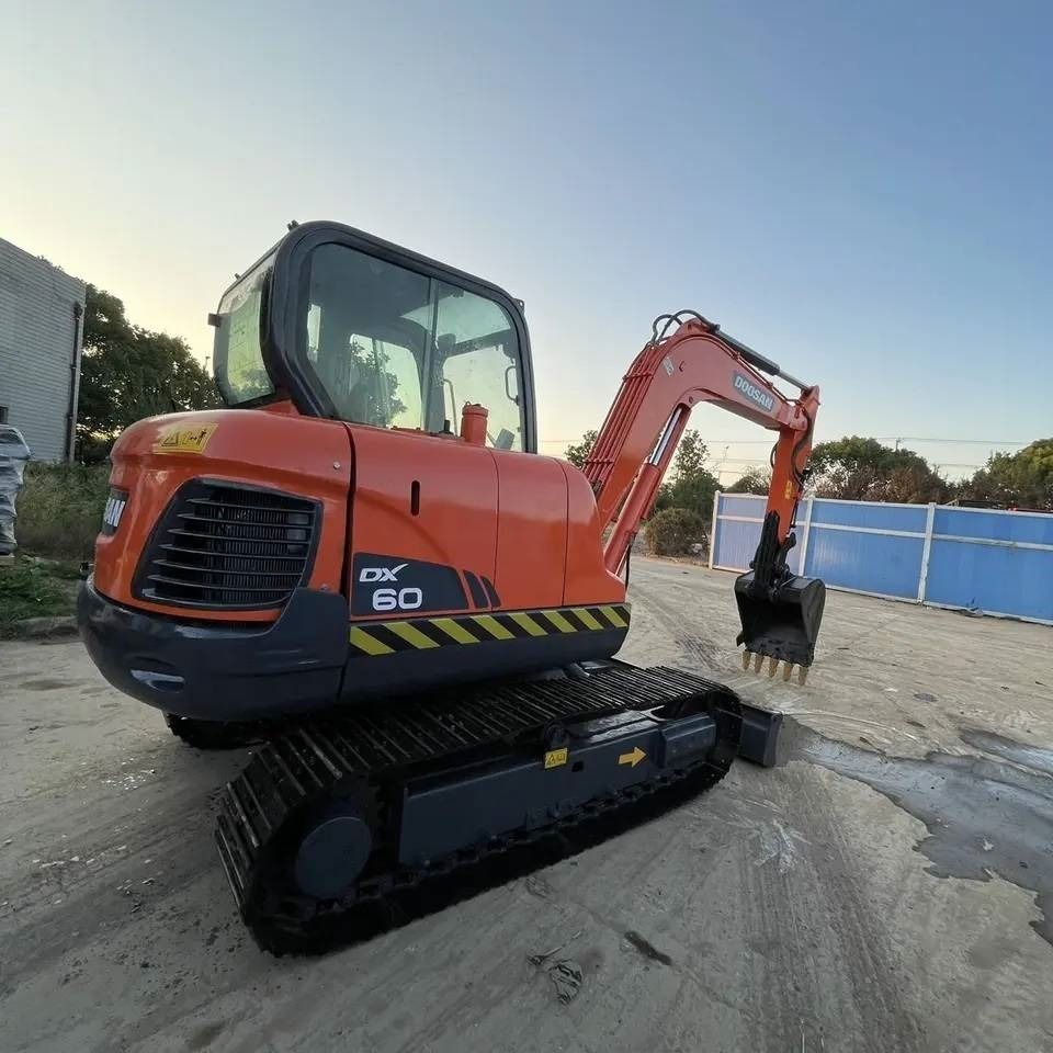 2022 Doosan DX60 mini excavator, rear three-quarter view