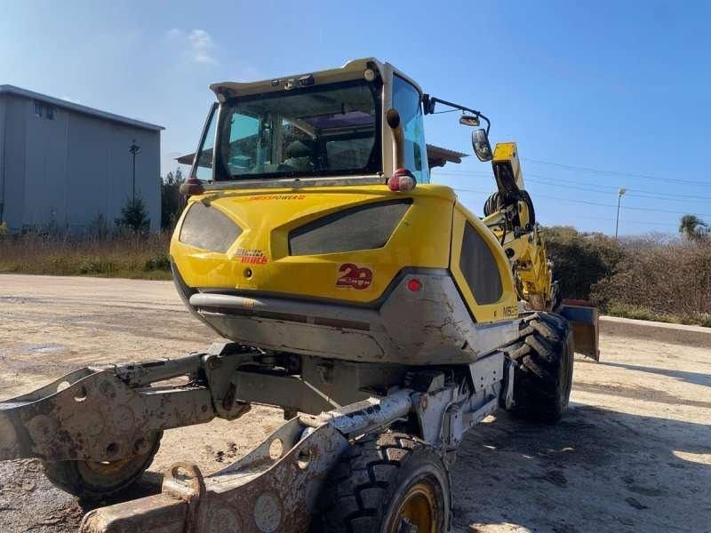 2016 Menzi Muck M525 walking excavator, rear three-quarter view