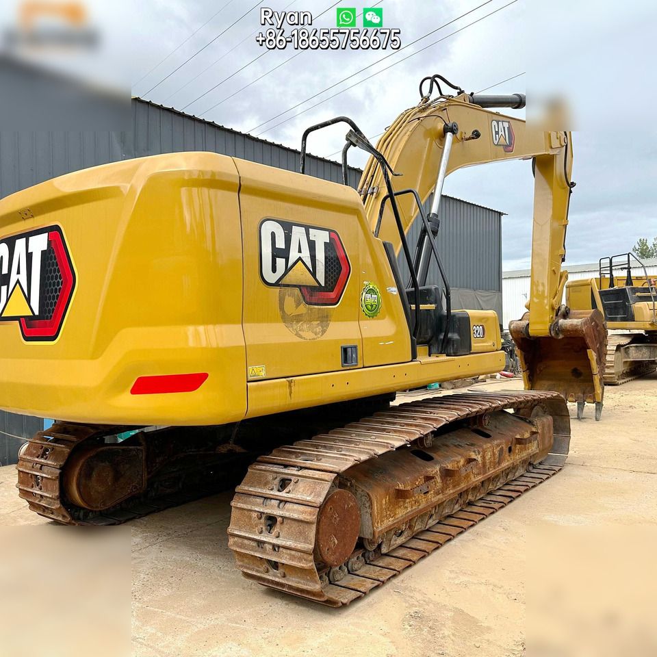 2023 Caterpillar 320 crawler excavator, rear three-quarter view