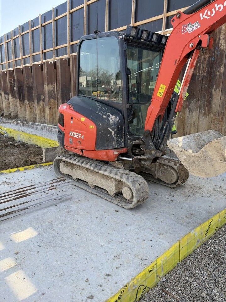 2022 Kubota KX027-4 mini excavator, side view 2022 Kubota KX027-4 mini excavator, side view