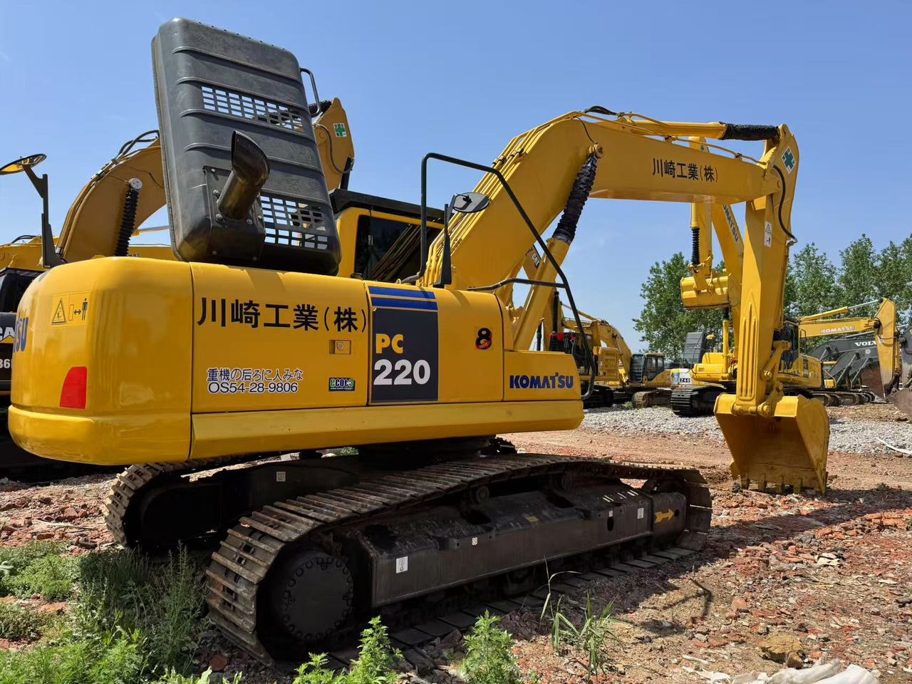 2024 Komatsu PC220 crawler excavator, rear three-quarter view 2024 Komatsu PC220 crawler excavator, rear three-quarter view