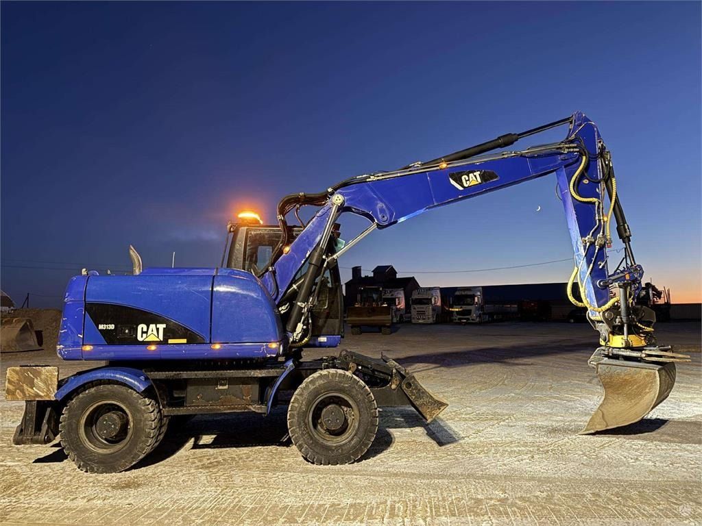 2014 Caterpillar M313D wheel excavator, side profile view 2014 Caterpillar M313D wheel excavator, side profile view