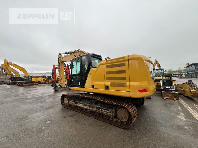 2020 Caterpillar 320-07D crawler excavator, rear three-quarter view