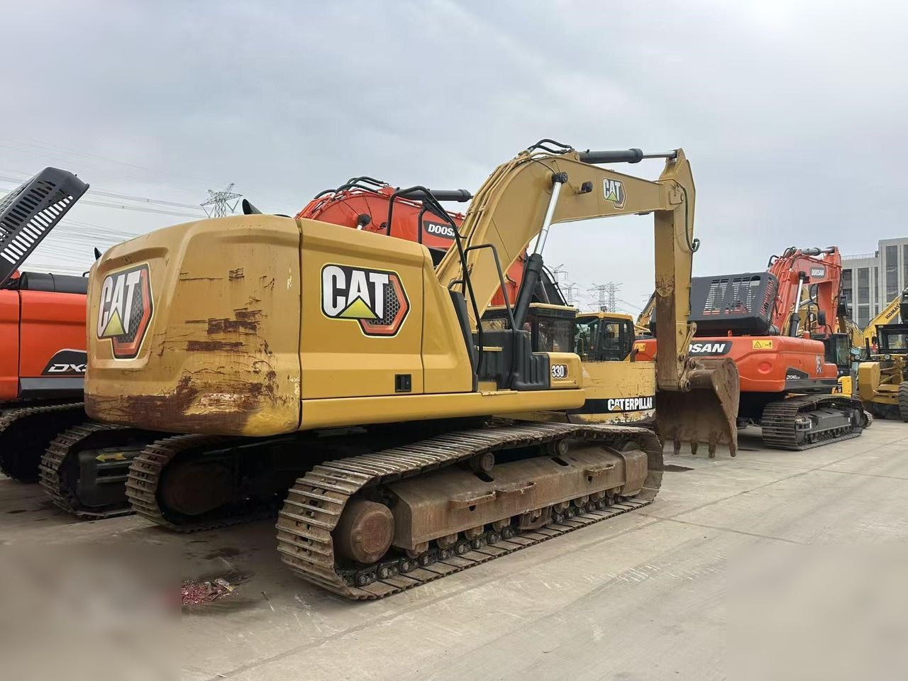 2019 Caterpillar 330 crawler excavator, rear three-quarter view