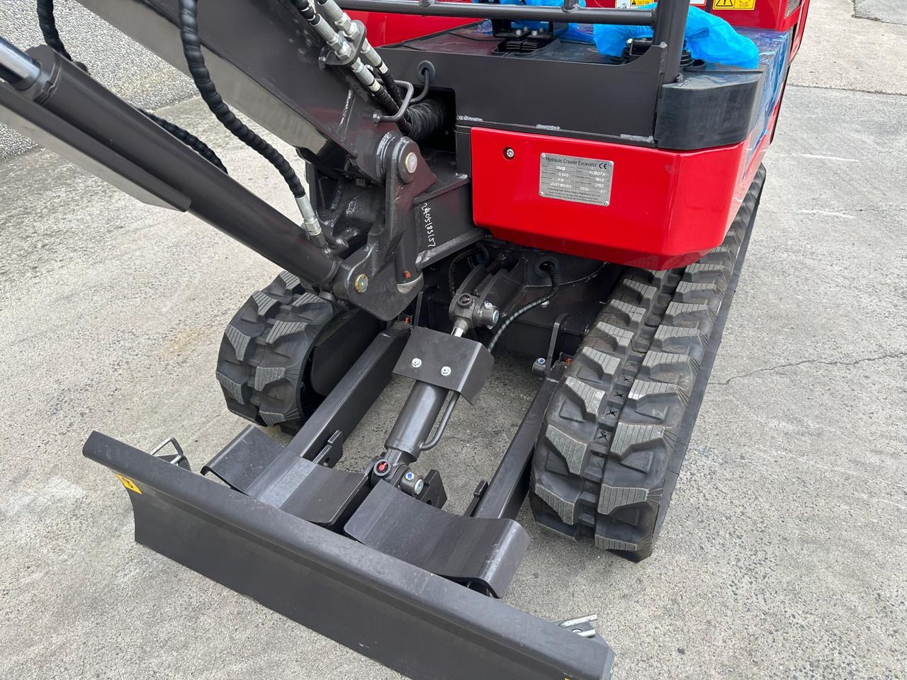 2026 Rhinoceros XN18 mini excavator front view with blade