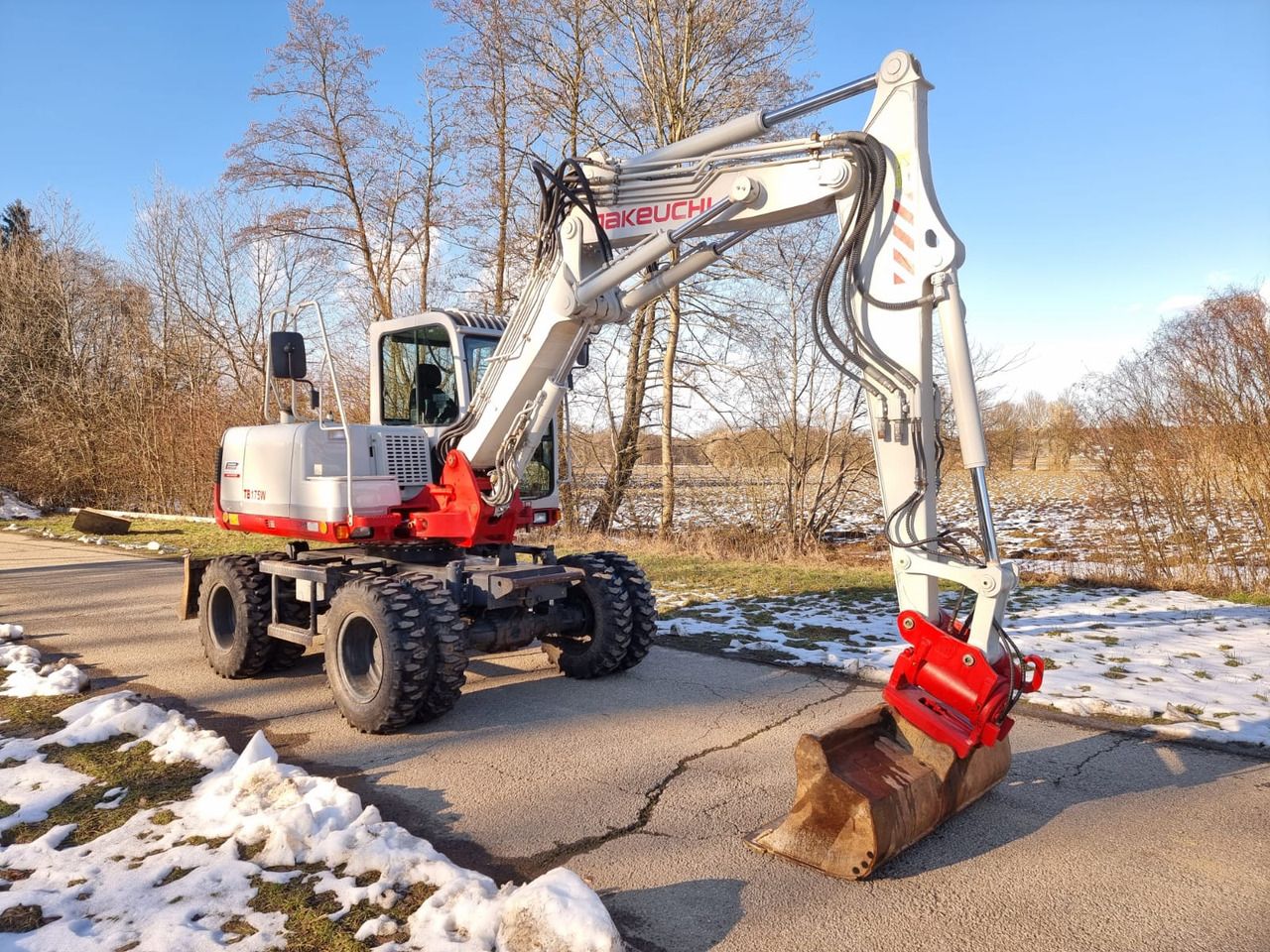 2013 Takeuchi TB175 W wheel excavator side view