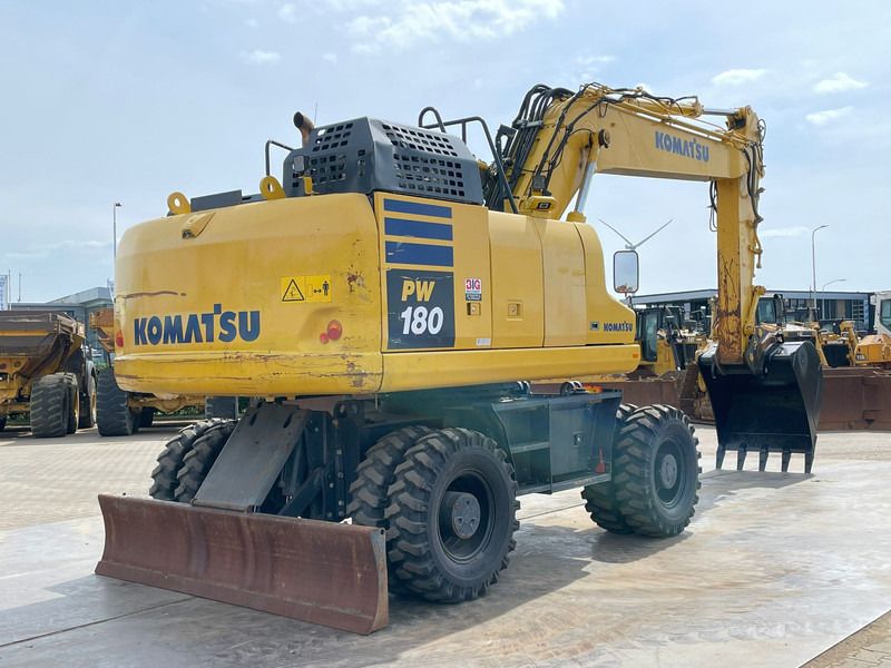 2019 Komatsu PW180-11 wheel excavator rear three-quarter view