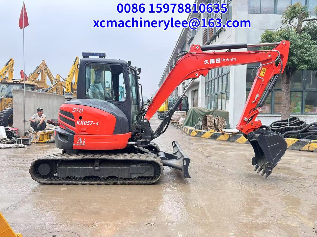 2023 Kubota KX057-4 mini excavator, side view