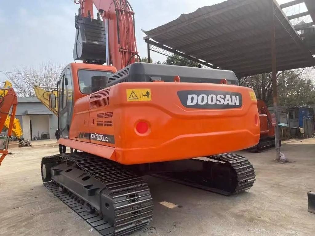 2023 Doosan DX300LC excavator, rear three-quarter view 2023 Doosan DX300LC excavator, rear three-quarter view