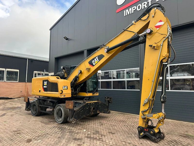 2015 Caterpillar MH3022 material handler, side view
