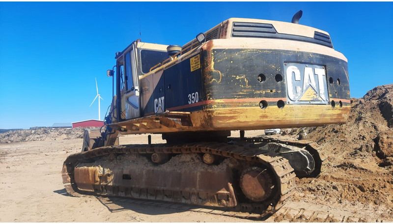 1994 Caterpillar 350L crawler excavator, rear three-quarter view