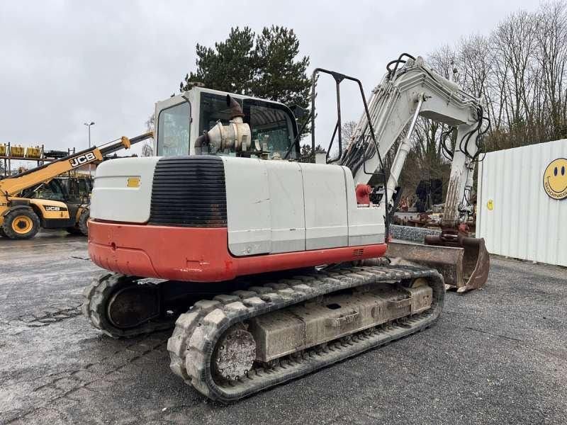2004 Takeuchi TB1140 crawler excavator, rear three-quarter view 2004 Takeuchi TB1140 crawler excavator, rear three-quarter view