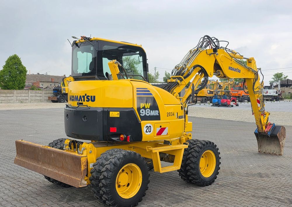 2017 Komatsu PW98MR-8 wheel excavator, rear three-quarter view 2017 Komatsu PW98MR-8 wheel excavator, rear three-quarter view