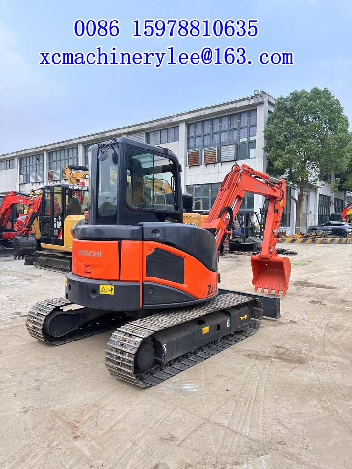 2024 Hitachi ZX50 mini excavator, rear three-quarter view 2024 Hitachi ZX50 mini excavator, rear three-quarter view