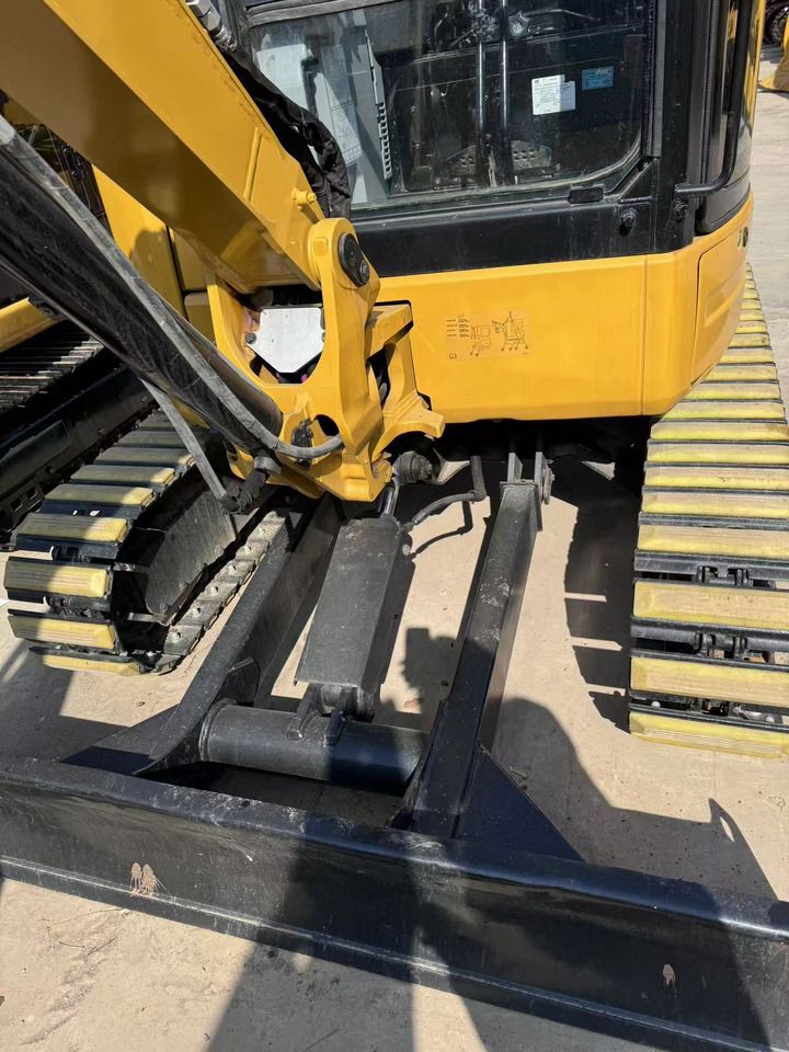2024 Caterpillar 303.5 mini excavator front blade view 2024 Caterpillar 303.5 mini excavator front blade view