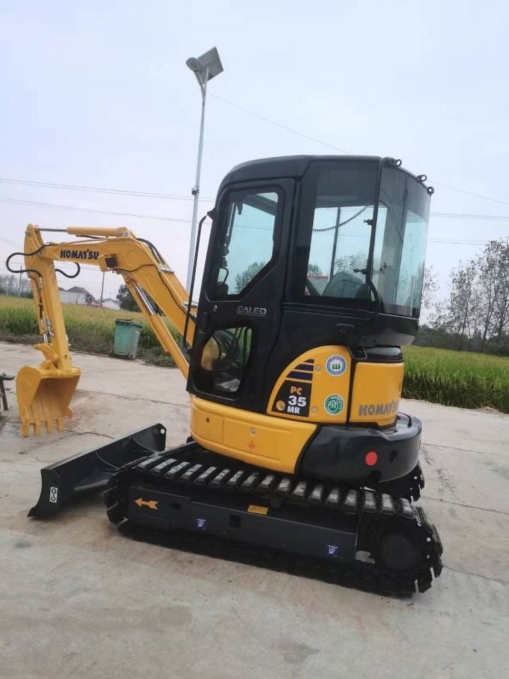 2023 Komatsu PC35MR mini excavator, front three-quarter view 2023 Komatsu PC35MR mini excavator, front three-quarter view