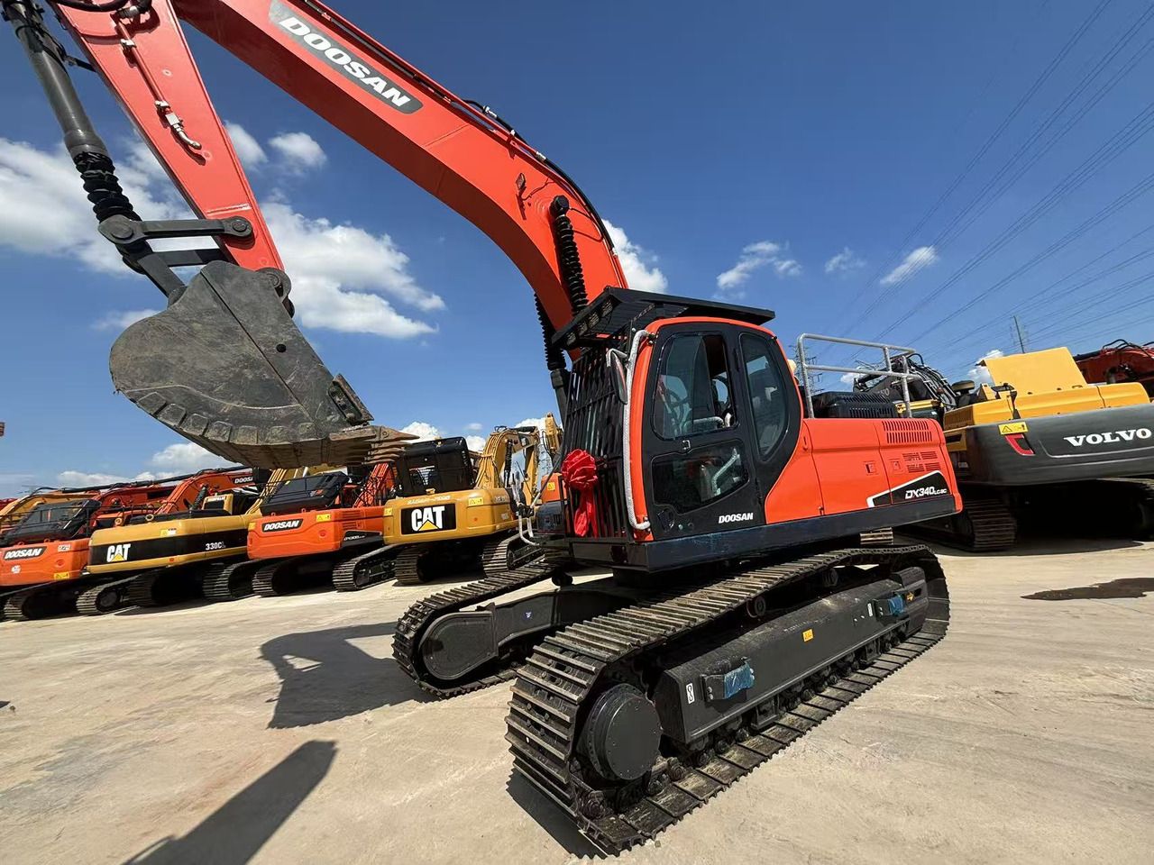 2023 Doosan DX340 crawler excavator, front three-quarter view