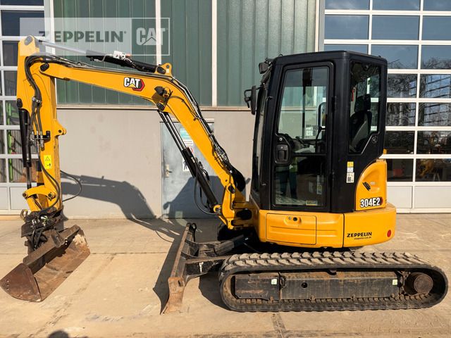 2021 Caterpillar 304E2 mini excavator side view 2021 Caterpillar 304E2 mini excavator side view