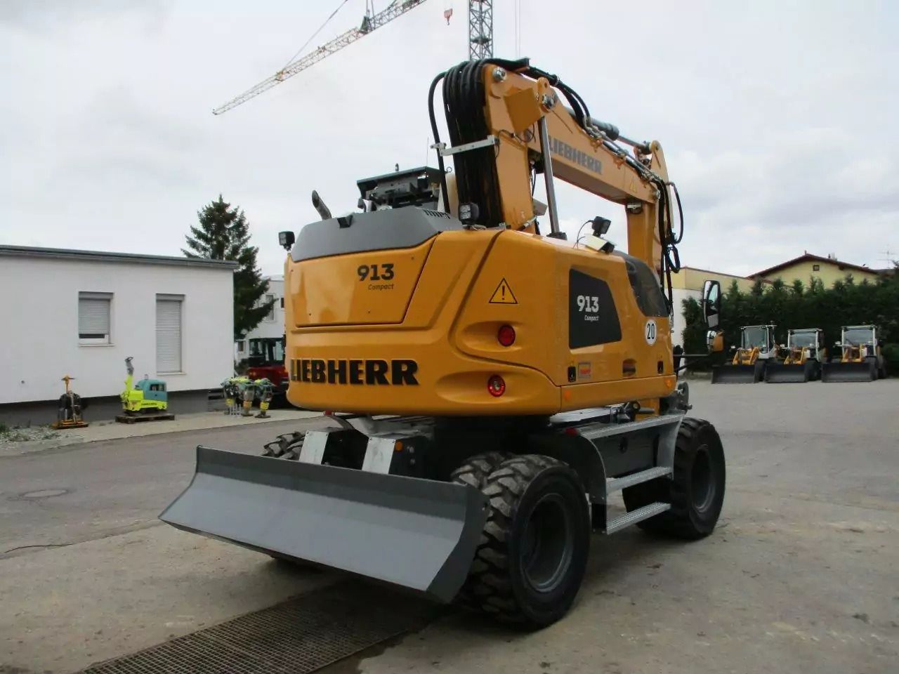 2023 Liebherr 913 Compact wheel excavator rear view 2023 Liebherr 913 Compact wheel excavator rear view