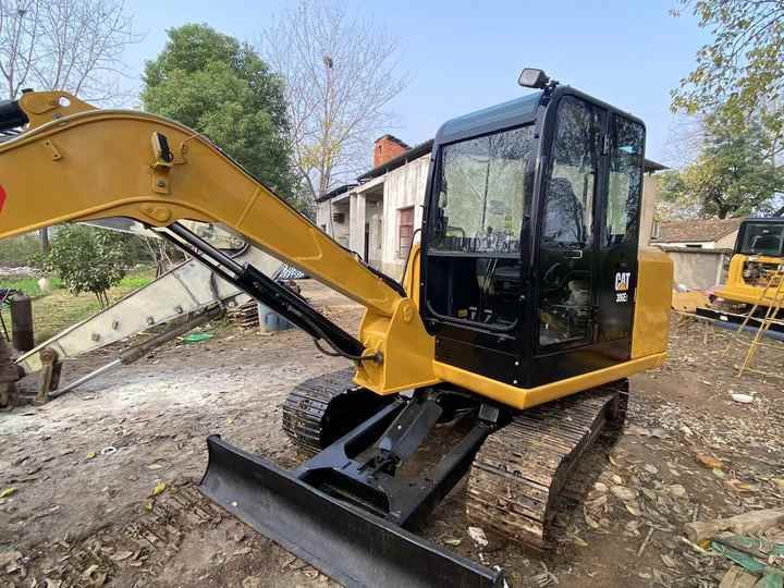 2022 Caterpillar 306E2 mini excavator, side view 2022 Caterpillar 306E2 mini excavator, side view