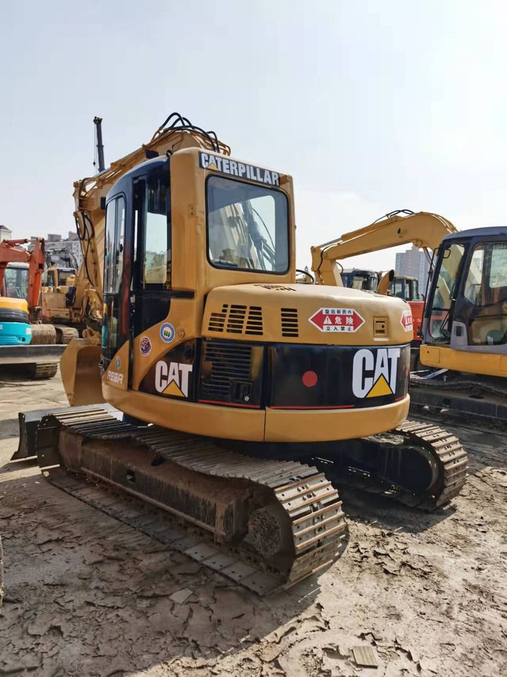 2010 Caterpillar 308C mini excavator, rear three-quarter view 2010 Caterpillar 308C mini excavator, rear three-quarter view