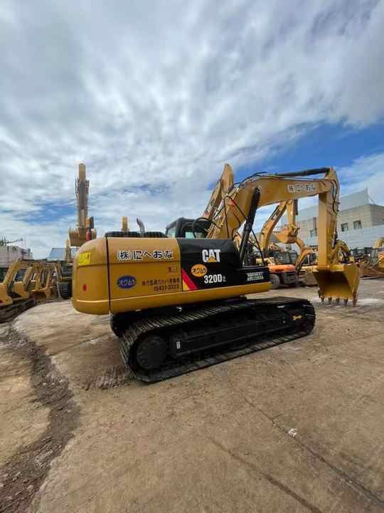 2008 Caterpillar 320D crawler excavator, rear three-quarter view 2008 Caterpillar 320D crawler excavator, rear three-quarter view