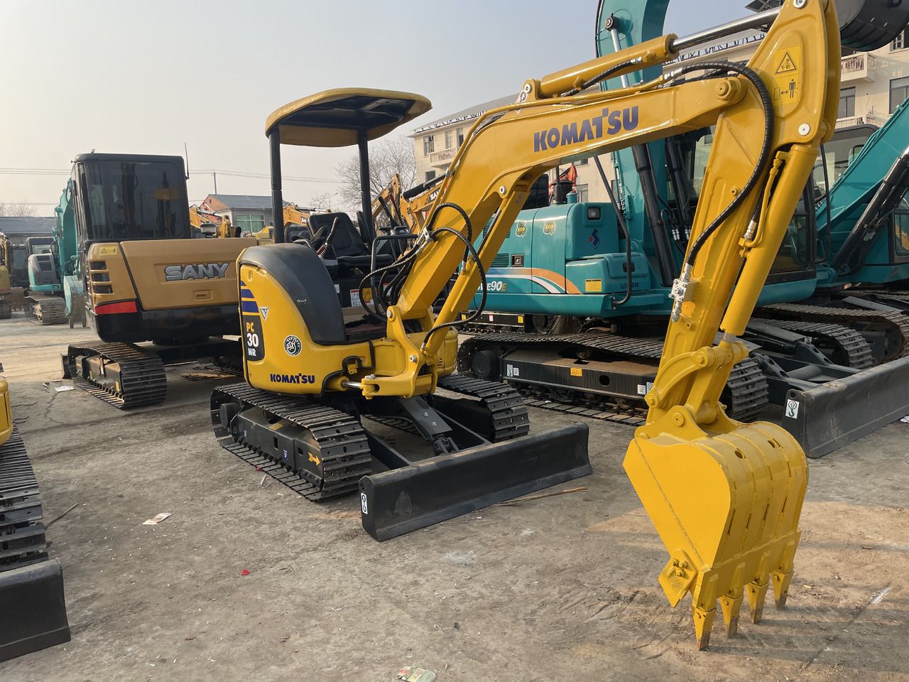 2023 Komatsu PC30MR-3 mini excavator, front three-quarter view 2023 Komatsu PC30MR-3 mini excavator, front three-quarter view