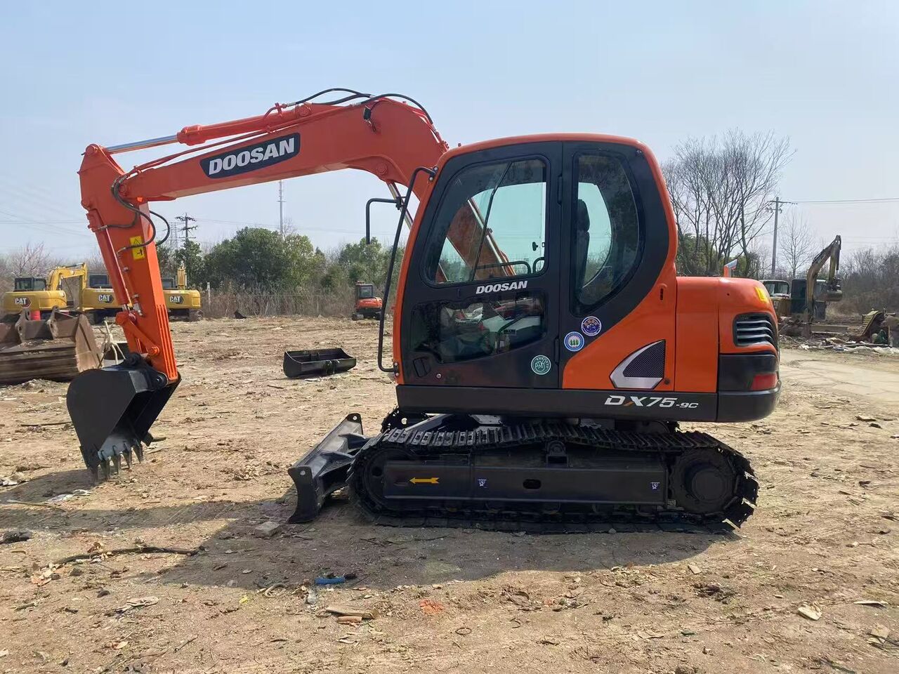 2024 Doosan DX75-9C mini excavator side view 2024 Doosan DX75-9C mini excavator side view