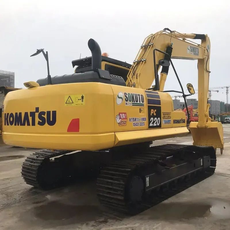 2022 Komatsu PC220 crawler excavator, rear three-quarter view 2022 Komatsu PC220 crawler excavator, rear three-quarter view