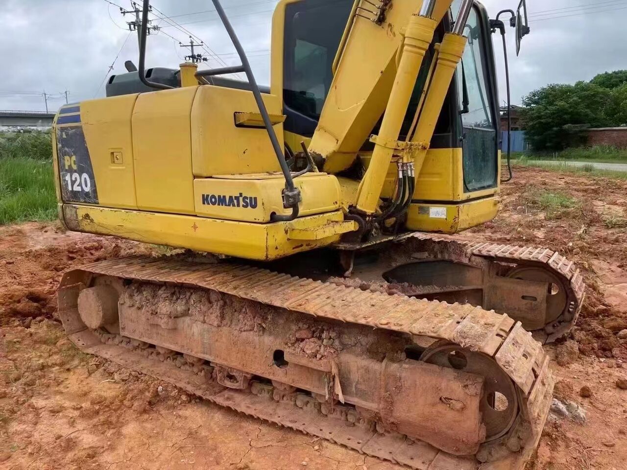 2024 Komatsu PC120-8 crawler excavator, rear three-quarter view
