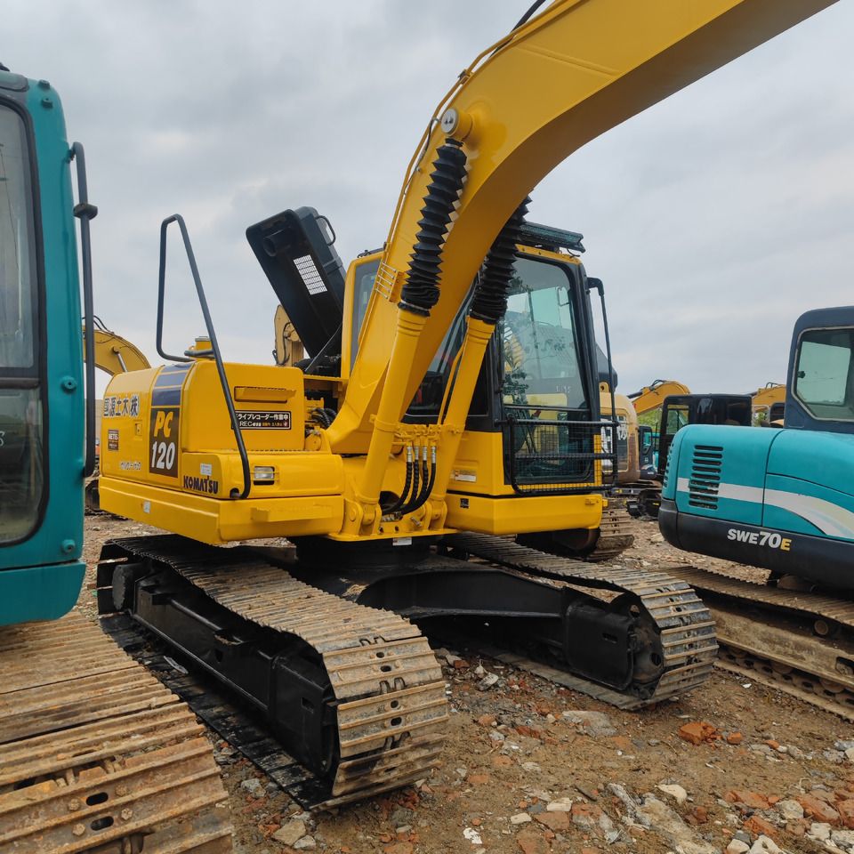 2023 Komatsu PC120-8 crawler excavator, rear three-quarter view 2023 Komatsu PC120-8 crawler excavator, rear three-quarter view