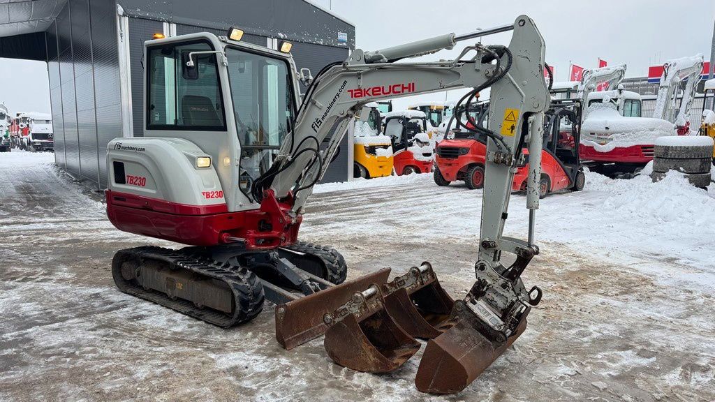 2017 Takeuchi TB230 mini excavator, side view