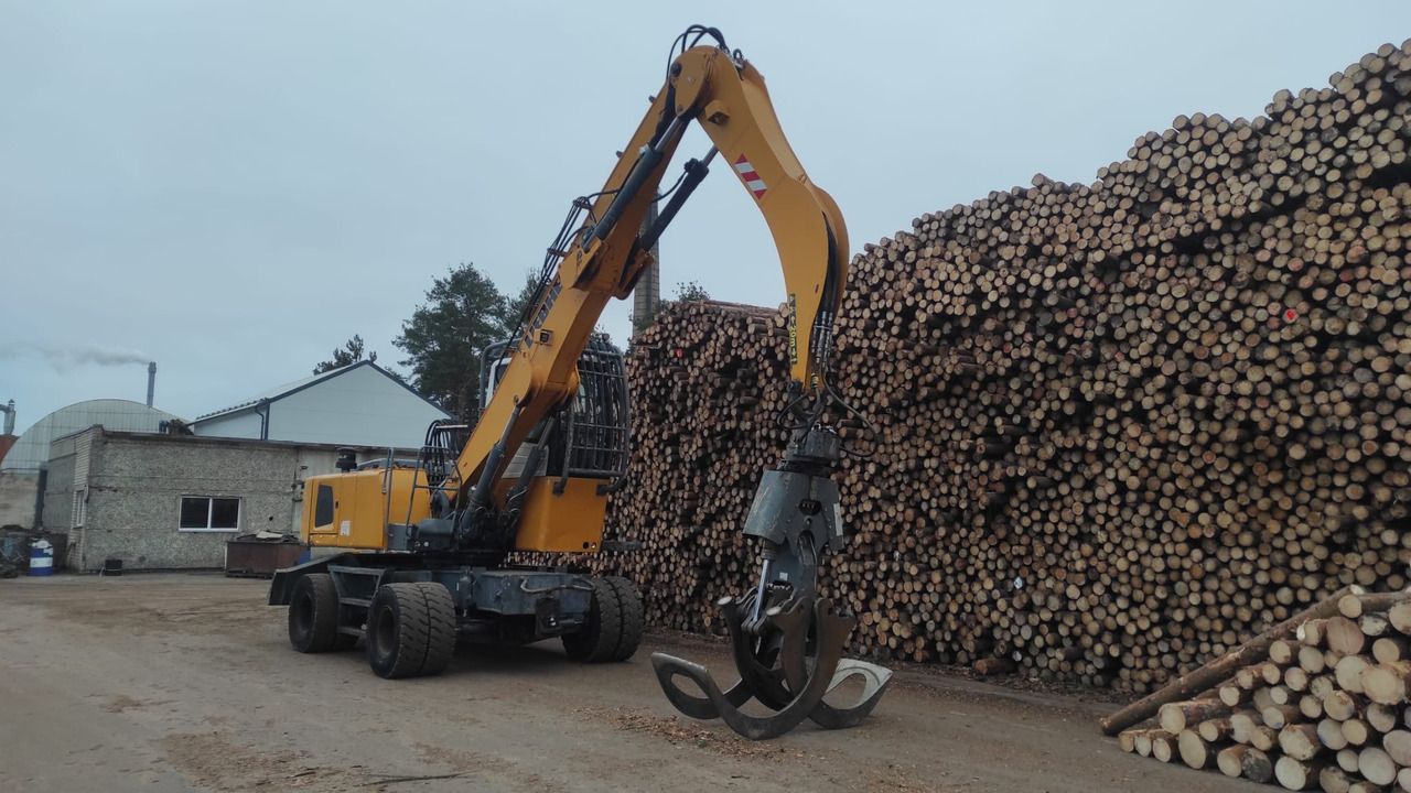 2015 Liebherr LH35 M material handler, side view 2015 Liebherr LH35 M material handler, side view