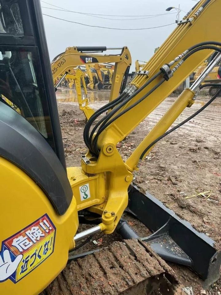 2024 Komatsu PC30MR mini excavator boom and cab detail