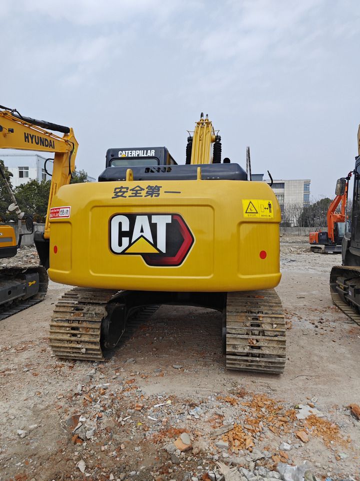 Caterpillar 315D2GC crawler excavator, rear view Caterpillar 315D2GC crawler excavator, rear view