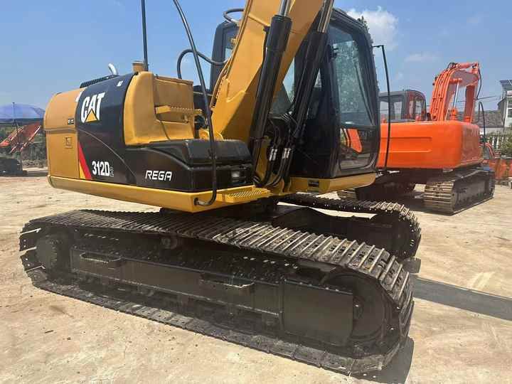 2013 Caterpillar 312D2 crawler excavator, rear three-quarter view 2013 Caterpillar 312D2 crawler excavator, rear three-quarter view