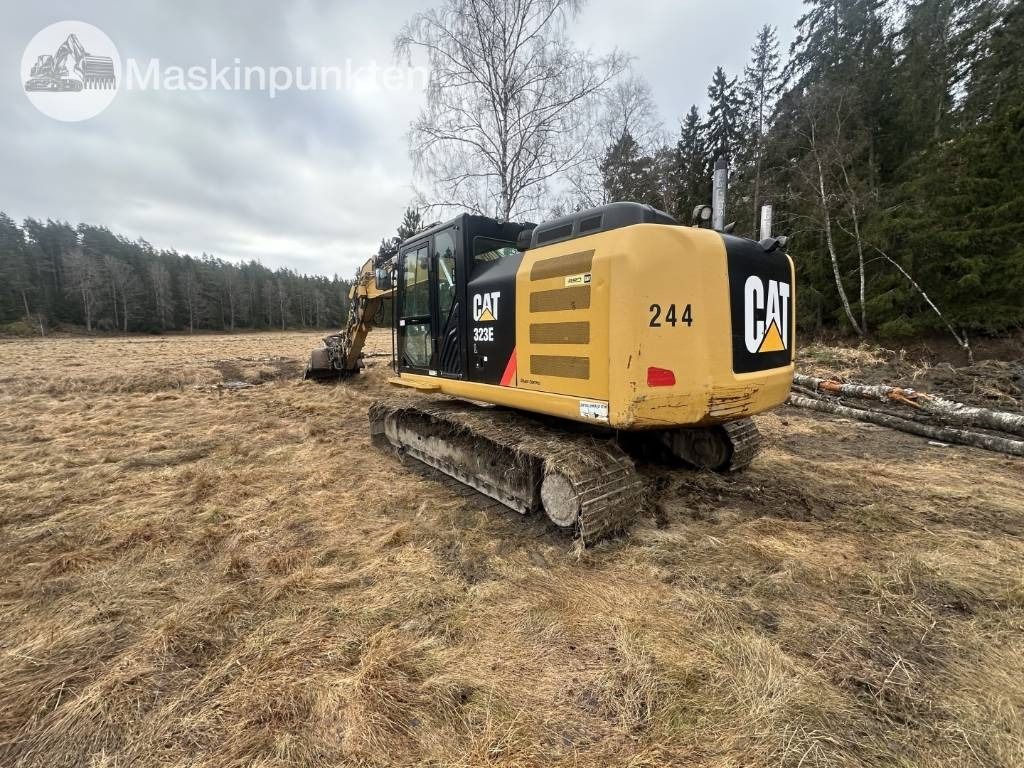 2015 Caterpillar 323E crawler excavator, rear three-quarter view