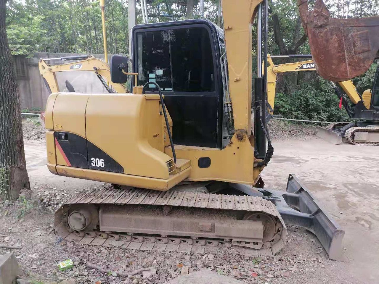 2022 Caterpillar 306 excavator side view 2022 Caterpillar 306 excavator side view
