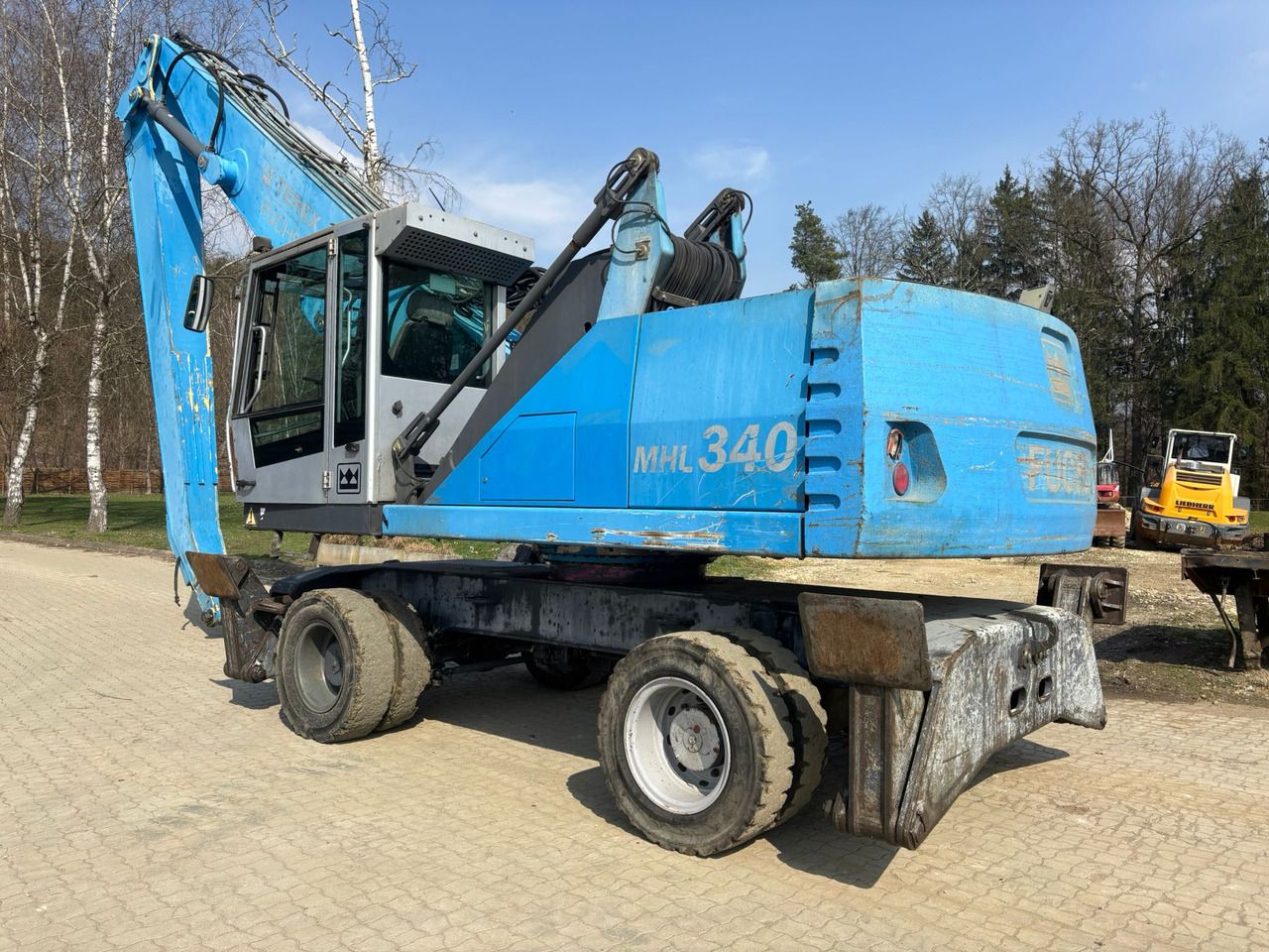 2011 Fuchs MHL340 wheel excavator, rear three-quarter view 2011 Fuchs MHL340 wheel excavator, rear three-quarter view